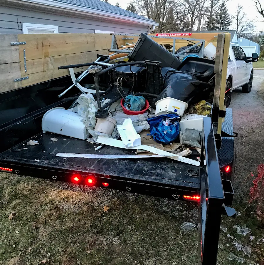 Roll-off dumpster delivered to a residential driveway in Clawson