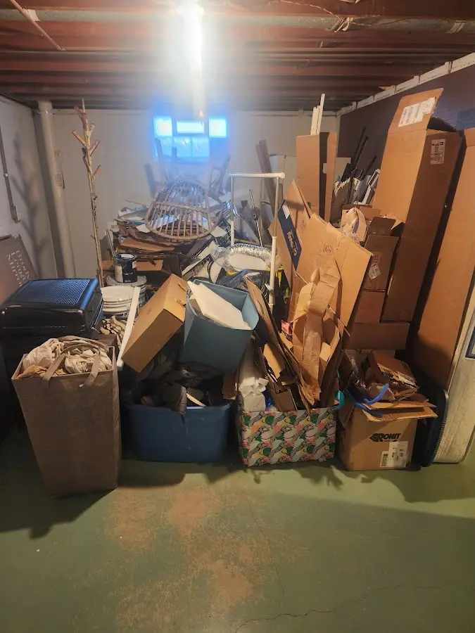 Roll-off dumpster container at job site for 2 Yard Dumpster Rental in Clawson